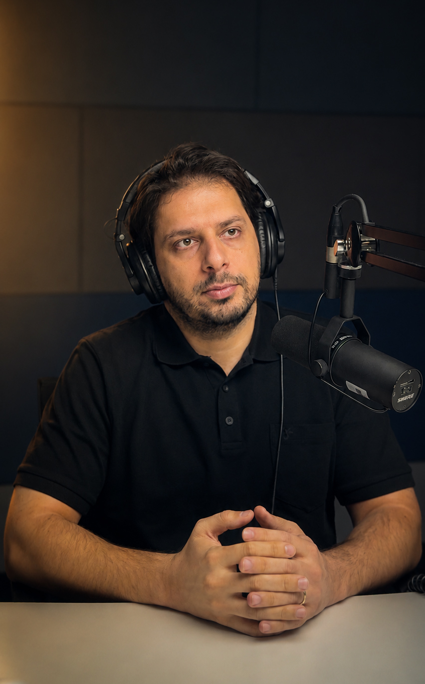 Hadi Alizadeh — studio portrait with headphones and microphone